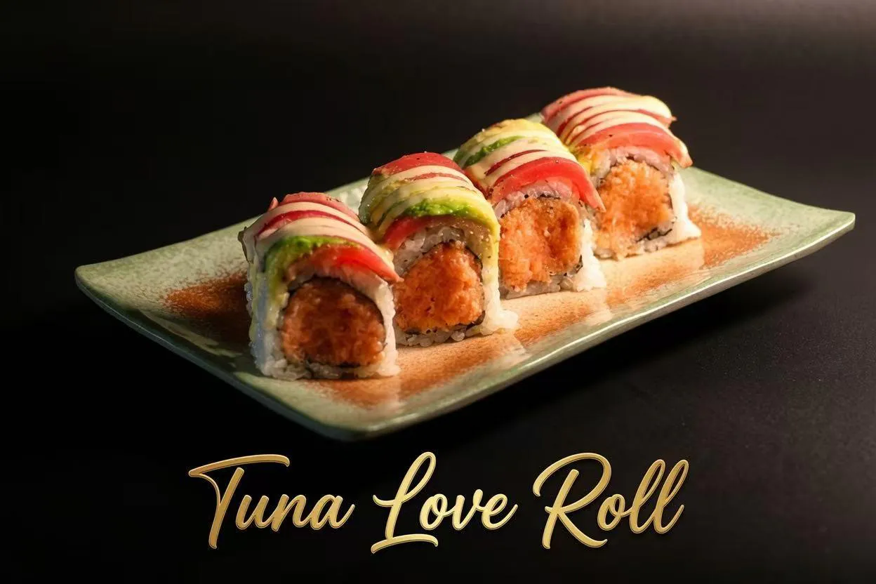 Four Tuna Love sushi roll slices topped with avocado and raw tuna over spicy fried tuna filling on textured ceramic platter at Akiyo, a Japanese Restaurant in Johnson City